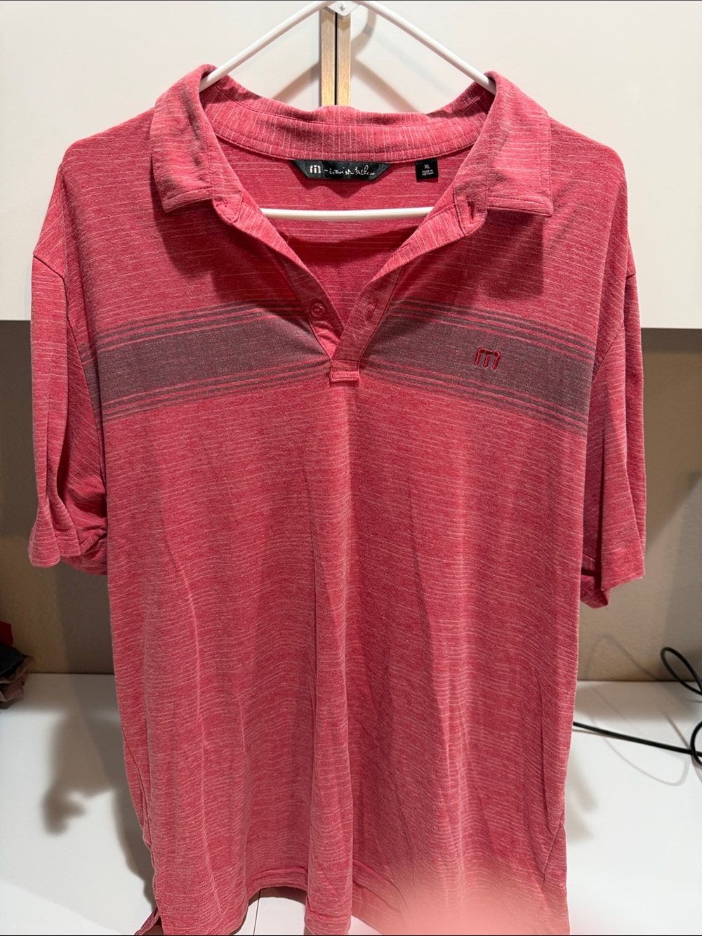 Travis Mathew Men's Heathered Coral Polo with Gray Stripe